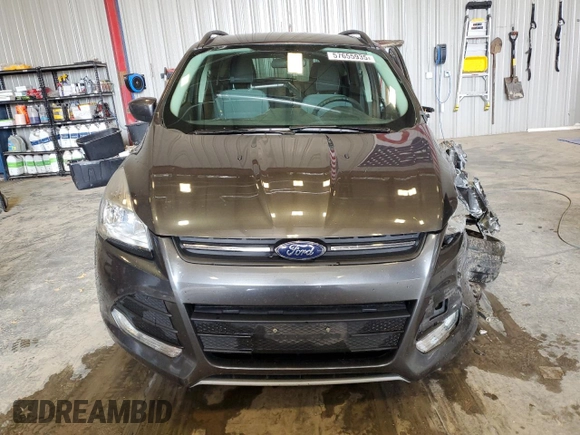 2016 Ford Escape SE z VIN 1FMCU9G99GUA67544, wystawiony jako Copart lot #57655935 z przebiegiem 156 913 mil mil oraz Nie do naprawy • Non repairable. Historia ofert i sprzedaży dostępna na DreamBid. Obrazek 5.