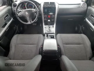 2009 Suzuki Grand Vitara z VIN JS3TD044794100716, wystawiony jako Copart lot #58739065 z przebiegiem 151 638 mil mil oraz Szkoda całkowita • Salvage title. Historia ofert i sprzedaży dostępna na DreamBid. Obrazek 8.