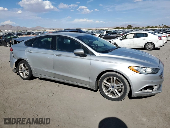 2018 Ford Fusion SE z VIN 3FA6P0LU7JR139974, wystawiony jako Copart lot #69819394 z przebiegiem 164 123 mil mil oraz Szkoda całkowita • Salvage title. Historia ofert i sprzedaży dostępna na DreamBid. Obrazek 4.
