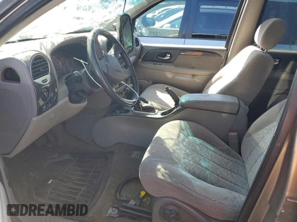 2003 GMC Envoy SLE with VIN 1GKDS13S732156385, listed as a Copart auction lot 79925184 with 233,958 mi miles and Salvage Title. Bid and sale history available at carsss.com. Image 7.