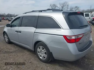 2013 Honda Odyssey LX with VIN 5FNRL5H22DB086503, listed as a IAAI auction lot 42133471 with 223,200 mi miles and . Bid and sale history available at carsss.com. Image 3.