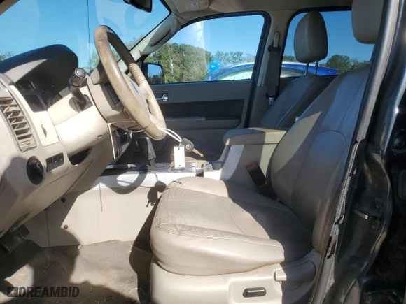2009 Mercury Mariner Premier with VIN 4M2CU87729KJ12913, listed as a Copart auction lot 81234994 with 194,091 mi miles and Salvage Title. Bid and sale history available at carsss.com. Image 7.