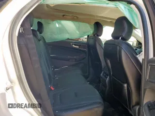 2017 Ford Edge Titanium z VIN 2FMPK4K87HBC26173, wystawiony jako Copart lot #58070565 z przebiegiem 63 989 mil mil oraz Szkoda całkowita • Salvage title. Historia ofert i sprzedaży dostępna na DreamBid. Obrazek 11.