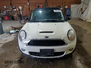 2009 MINI Hardtop S with VIN WMWMF73509TW83066, listed as a Copart auction lot 58603205 with 113,242 mi miles and Salvage title. Bid and sale history available at DreamBid. Image 5.