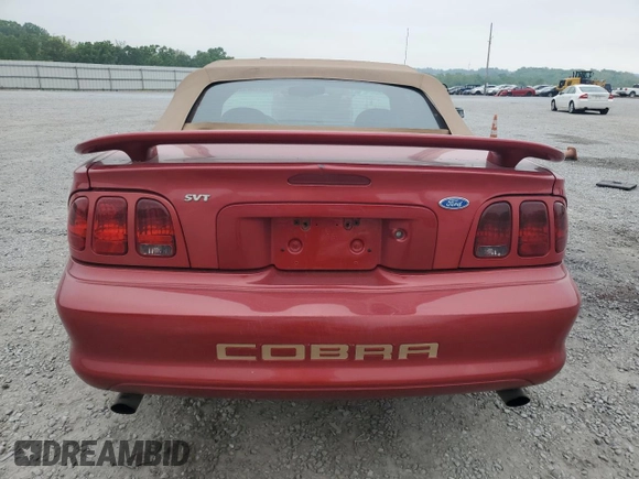 1996 Ford Mustang Cobra with VIN 1FALP46V7TF187912, listed as a Copart auction lot 54401505 with 116,465 mi miles and Salvage title. Bid and sale history available at DreamBid. Image 6.