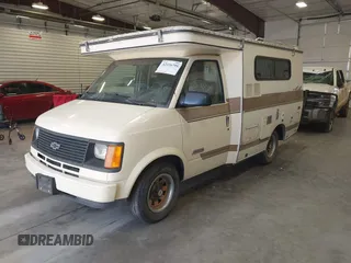 1991 Chevrolet Astro z VIN 1GCDM15Z8MB180051, wystawiony jako IAAI lot #42226795 z przebiegiem 163 024 mil mil oraz . Historia ofert i sprzedaży dostępna na DreamBid. Obrazek 2.