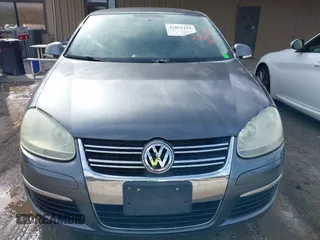 2009 Volkswagen Jetta Wolfsburg Edition with VIN 3VWRJ71K99M023071, listed as a IAAI auction lot 41853293 with 121,311 mi miles and . Bid and sale history available at DreamBid. Image 6.