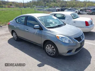2012 Nissan Versa SL with VIN 3N1CN7AP7CL921404, listed as a IAAI auction lot 42044819 with 126,942 mi miles. Bid and sale history available at carsss.com. Image 1.