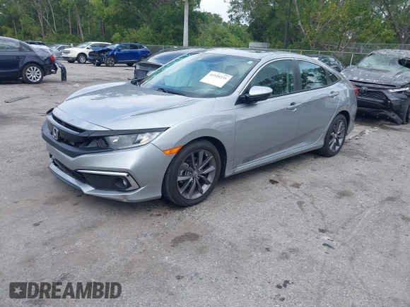 2021 Honda Civic Sedan EX-L with VIN 19XFC1F77ME008461, listed as a IAAI auction lot 41920231 with 31,912 mi miles. Bid and sale history available at carsss.com. Image 2.