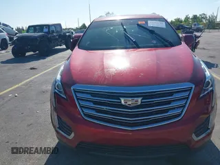 2019 Cadillac XT5 FWD with VIN 1GYKNARS9KZ173920, listed as a IAAI auction lot 42321141 with Not provided miles and . Bid and sale history available at DreamBid. Image 6.
