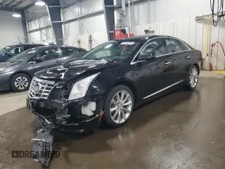 2014 Cadillac XTS Luxury z VIN 2G61N5S35E9133430, wystawiony jako Copart lot #54746235 z przebiegiem 157 544 mil mil oraz Szkoda całkowita • Salvage title. Historia ofert i sprzedaży dostępna na DreamBid. Obrazek 1.