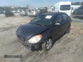 2006 Hyundai Accent GLS z VIN KMHCN46C66U027692, wystawiony jako IAAI lot #41796140 z przebiegiem 233 488 mil mil oraz . Historia ofert i sprzedaży dostępna na DreamBid. Obrazek 17.