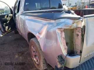 2012 Nissan Titan SE with VIN 1N6AA0CA6CN312785, listed as a IAAI auction lot 40810558 with 122,078 mi miles. Bid and sale history available at carsss.com. Image 6.