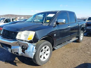 2004 Nissan Titan LE with VIN 1N6AA07A44N591357, listed as a IAAI auction lot 41464024 with 296,954 mi miles and . Bid and sale history available at DreamBid. Image 18.