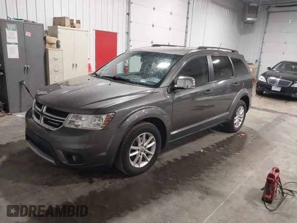 2013 Dodge Journey SXT with VIN 3C4PDDBG4DT600078, listed as a IAAI auction lot 42060076 with 167,943 mi miles and . Bid and sale history available at DreamBid. Image 2.