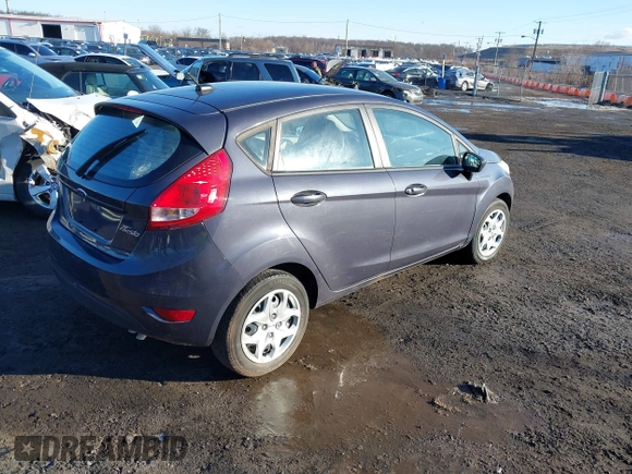 2013 Ford Fiesta S z VIN 3FADP4TJ5DM164278, wystawiony jako IAAI lot #41588415 z przebiegiem 13 403 mil mil oraz . Historia ofert i sprzedaży dostępna na DreamBid. Obrazek 4.