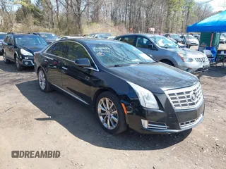 2014 Cadillac XTS Luxury with VIN 2G61M5S3XE9202454, listed as a IAAI auction lot 42025883 with 93,977 mi miles and . Bid and sale history available at DreamBid. Image 1.
