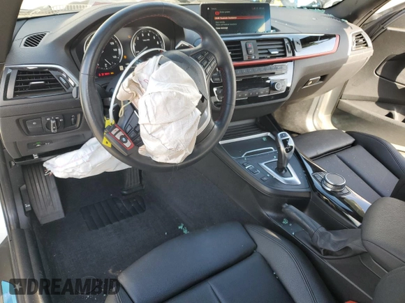 2021 BMW 2 Series 230i with VIN WBA2J1C04M7G50843, listed as a Copart auction lot 44719905 with 31,728 mi miles and Salvage Title. Bid and sale history available at carsss.com. Image 8.