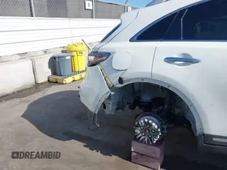 2017 Infiniti QX70 z VIN JN8CS1MU1HM141873, wystawiony jako IAAI lot #42345889 z przebiegiem 65 090 mil mil oraz . Historia ofert i sprzedaży dostępna na DreamBid. Obrazek 6.