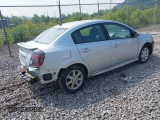 2012 Nissan Sentra S with VIN 3N1AB6AP5CL744409, listed as a IAAI auction lot 42424939 with 152,860 mi miles and . Bid and sale history available at DreamBid. Image 4.