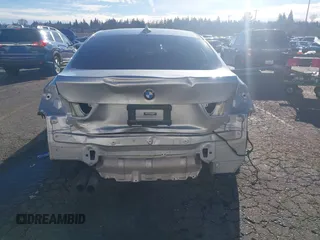 2015 BMW 4 Series 428i with VIN WBA4A5C58FG051293, listed as a IAAI auction lot 41255541 with 60,737 mi miles and . Bid and sale history available at DreamBid. Image 17.