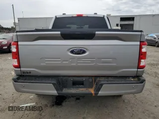 2023 Ford F-150 XL с VIN 1FTFW1E50PFB67954, выставлен на аукционе Copart как лот 51369995 с пробегом 56 024 миль миль и Списание • Salvage title. История ставок и продаж доступна на DreamBid. Изображение 6.