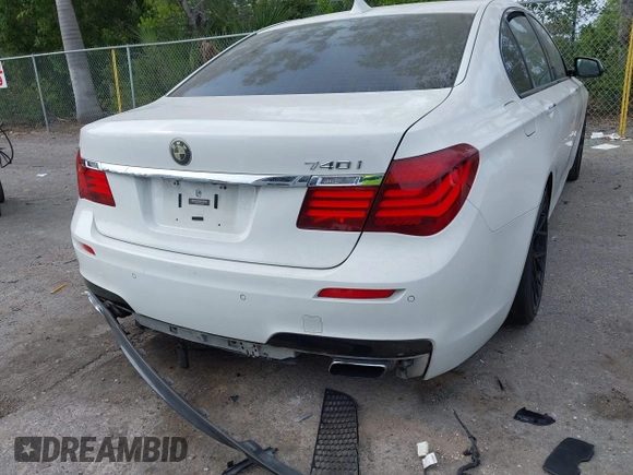 2013 BMW 7 Series 740i with VIN WBAYA6C52DD143862, listed as a IAAI auction lot 41859183 with 133,666 mi miles. Bid and sale history available at carsss.com. Image 6.