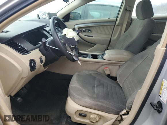 2015 Ford Taurus SE with VIN 1FAHP2D84FG149799, listed as a Copart auction lot 88993345 with 114,131 mi miles and Salvage Title. Bid and sale history available at DreamBid. Image 7.