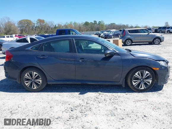 2016 Honda Civic EX-L with VIN 19XFC1F72GE044319, listed as a IAAI auction lot 41823220 with 129,868 mi miles and . Bid and sale history available at DreamBid. Image 13.