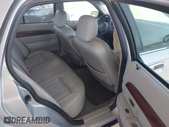 2003 Mercury Grand Marquis LS Premium z VIN 2MEFM75W83X631023, wystawiony jako IAAI lot #42227245 z przebiegiem 114 235 mil mil oraz . Historia ofert i sprzedaży dostępna na DreamBid. Obrazek 8.