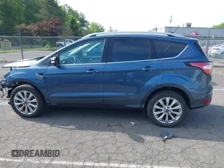 2018 Ford Escape Titanium with VIN 1FMCU9J92JUB01162, listed as a IAAI auction lot 42495112 with 96,280 mi miles and . Bid and sale history available at DreamBid. Image 15.