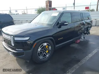 2023 Rivian R1S Launch Edition with VIN 7PDSGABL5PN008523, listed as a IAAI auction lot 40987625 with 26,058 mi miles. Bid and sale history available at carsss.com. Image 22.
