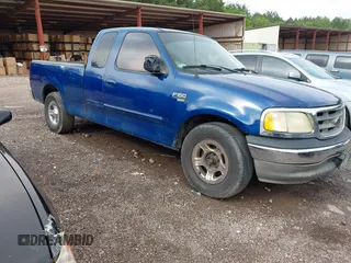2002 Ford F-150 XL z VIN 1FTRX17W12NC06310, wystawiony jako IAAI lot #42160213 z przebiegiem Nie podano mil oraz . Historia ofert i sprzedaży dostępna na DreamBid. Obrazek 1.