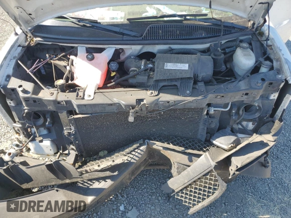 2007 Chevrolet Express Passenger z VIN 1GAHG35U271208048, wystawiony jako Copart lot #62064964 z przebiegiem Nie podano mil oraz Szkoda całkowita • Salvage title. Historia ofert i sprzedaży dostępna na DreamBid. Obrazek 13.