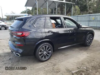 2022 BMW X5 xDrive40i with VIN 5UXCR6C05N9M87988, listed as a Copart auction lot 70896652 with 571 mi miles. Bid and sale history available at carsss.com. Image 3.