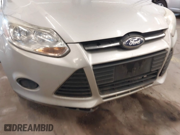 2013 Ford Focus SE z VIN 1FADP3F24DL277767, wystawiony jako IAAI lot #41562390 z przebiegiem 183 322 mil mil oraz . Historia ofert i sprzedaży dostępna na DreamBid. Obrazek 13.