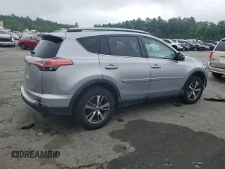 2018 Toyota RAV4 XLE with VIN 2T3RFREV8JW741461, listed as a Copart auction lot 57728244 with 88,925 mi miles and Salvage Title. Bid and sale history available at DreamBid. Image 3.