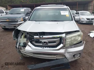 2011 Honda Pilot EX-L with VIN 5FNYF3H6XBB036391, listed as a IAAI auction lot 41100998 with 120,516 mi miles and . Bid and sale history available at DreamBid. Image 6.