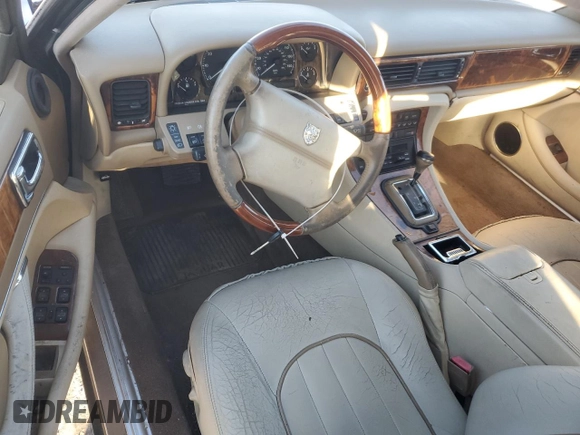 1995 Jaguar XJ with VIN SAJKX1747SC722815, listed as a Copart auction lot 83743934 with Not Provided miles and Clean Title. Bid and sale history available at DreamBid. Image 8.