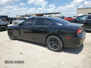2013 Dodge Charger Police with VIN 2C3CDXAT1DH669564, listed as a Copart auction lot 56682395 with 157,650 mi miles and Clean Title. Bid and sale history available at DreamBid. Image 2.