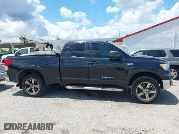 2012 Toyota Tundra z VIN 5TFRY5F17CX128888, wystawiony jako IAAI lot #42508395 z przebiegiem 279 524 mil mil oraz . Historia ofert i sprzedaży dostępna na DreamBid. Obrazek 13.