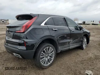 2024 Cadillac XT4 FWD Premium Luxury z VIN 1GYFZCR44RF241880, wystawiony jako Copart lot #44975635 z przebiegiem 2 385 mil mil oraz Szkoda całkowita • Salvage title. Historia ofert i sprzedaży dostępna na DreamBid. Obrazek 3.