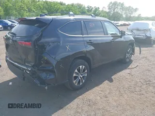 2023 Toyota Highlander L with VIN 5TDKDRBHXPS030361, listed as a IAAI auction lot 42230419 with 59,404 mi miles and . Bid and sale history available at DreamBid. Image 4.