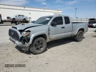 2019 Toyota Tacoma SR5 with VIN 5TFSZ5AN0KX181679, listed as a Copart auction lot 58877375 with 146,075 mi miles and Salvage title. Bid and sale history available at DreamBid. Image 1.