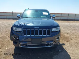 2015 Jeep Grand Cherokee Overland with VIN 1C4RJECG3FC635327, listed as a IAAI auction lot 41910559 with 118,519 mi miles and . Bid and sale history available at DreamBid. Image 12.