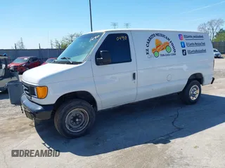 2004 Ford Econoline Cargo Commercial with VIN 1FTSE34P54HB35498, listed as a IAAI auction lot 41970490 with 155,186 mi miles. Bid and sale history available at carsss.com. Image 2.