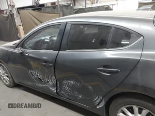 2015 Mazda 3 i Touring with VIN JM1BM1L75F1259985, listed as a IAAI auction lot 41067447 with 104,865 mi miles and . Bid and sale history available at carsss.com. Image 14.