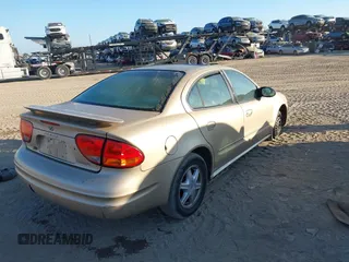 2004 Oldsmobile Alero GL1 z VIN 1G3NL52E34C191243, wystawiony jako IAAI lot #41536825 z przebiegiem 117 998 mil mil oraz . Historia ofert i sprzedaży dostępna na DreamBid. Obrazek 4.