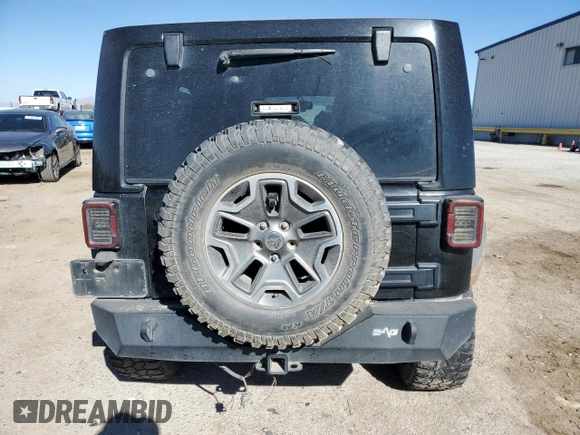 2013 Jeep Wrangler Unlimited Rubicon with VIN 1C4BJWFG2DL533839, listed as a Copart auction lot 88917985 with 112,673 mi miles and Salvage Title. Bid and sale history available at carsss.com. Image 6.