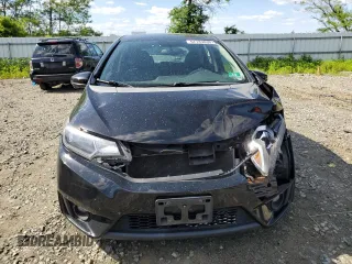 2015 Honda Fit EX-L z VIN 3HGGK5H88FM705989, wystawiony jako Copart lot #57143835 z przebiegiem 132 747 mil mil oraz Szkoda całkowita • Salvage title. Historia ofert i sprzedaży dostępna na DreamBid. Obrazek 5.